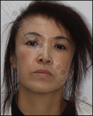 Xiao Cui, 51, charged after working in massage parlor without a license