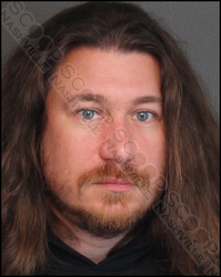 Robert Thurman charged after tossing beer through vehicle window onto occupants