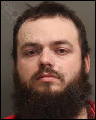 Alexander Hutchins urinates on side of downtown jail